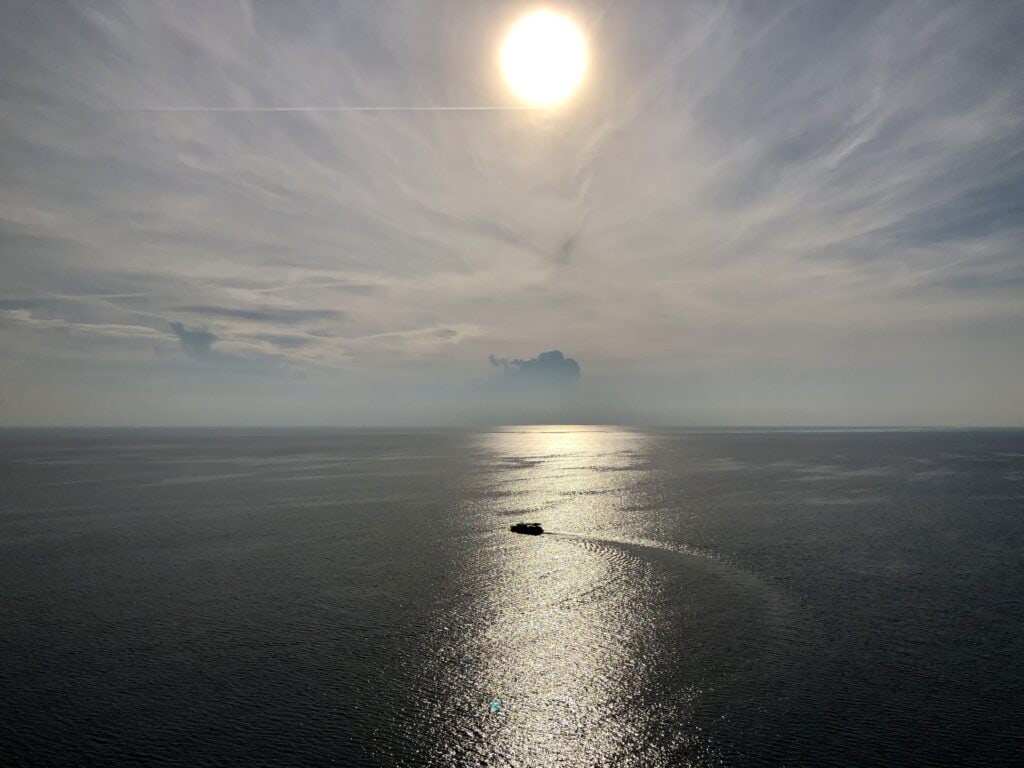 View of the Adriatic sea with the sun over it. Dubrovnik, Croatia