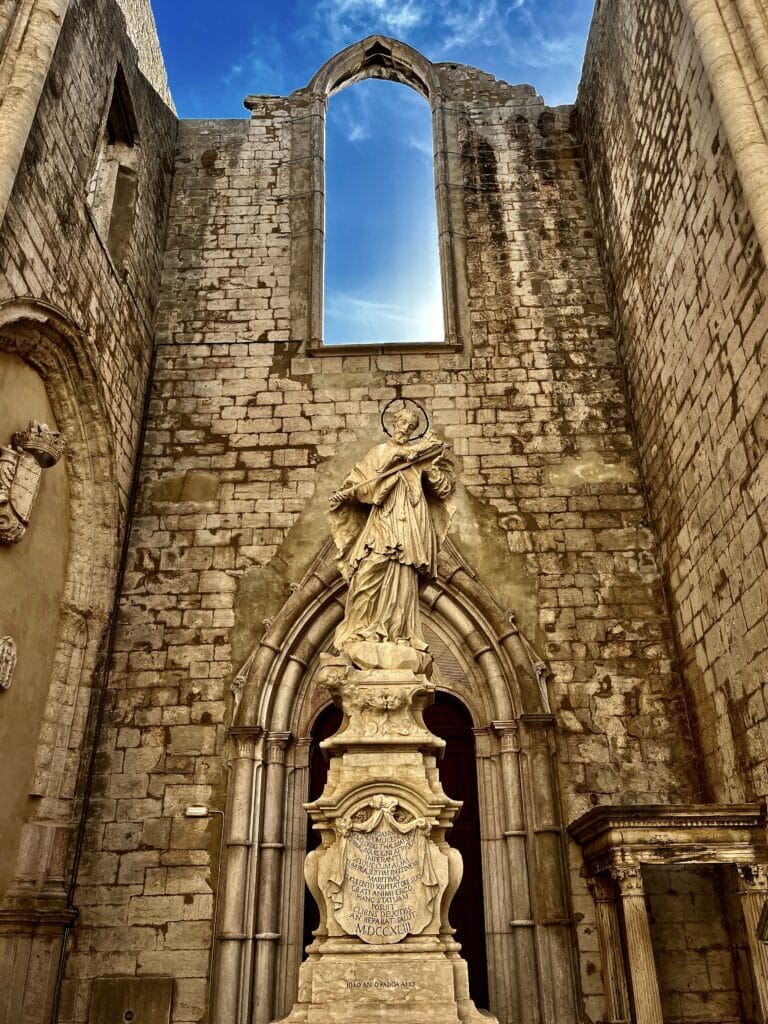 View of a statue in Carmo Convent, road trip in Portugal